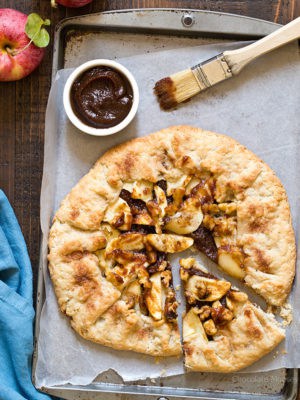 Easier than pie! Apple Butter Galette is an open-faced pie made with homemade pie crust, apple butter, fresh apple slices, and walnuts.