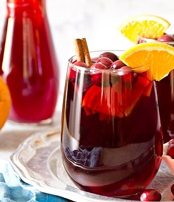 Make your next holiday cocktail an easy one with Cranberry Orange Sangria made with red wine, cranberry juice, and oranges.