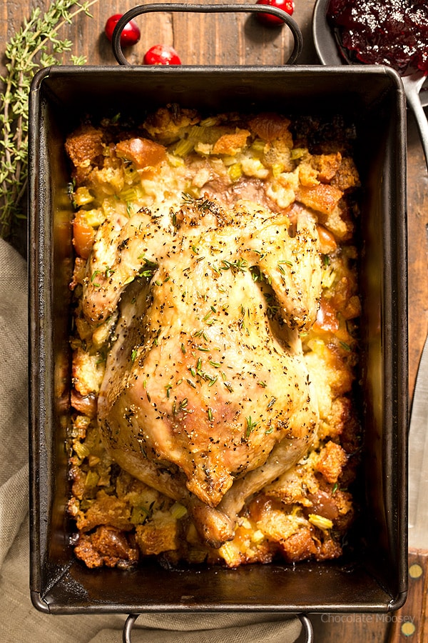 Close up of Cornish hen in pan with stuffing