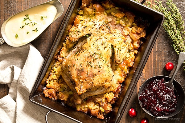 Cornish hen in roasting pan with stuffing