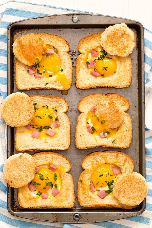 Tray of baked eggs with ham and cheese