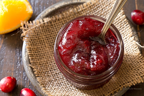 Easy cranberry sauce with a spoon in a jar