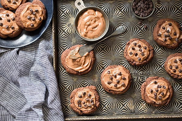 Hate cutting out sugar cookies? No need to roll and cut dough with Soft Chocolate Sugar Cookies! Just scoop and bake then frost with a creamy chocolate frosting. Top with chocolate sprinkles or mini chocolate chips.