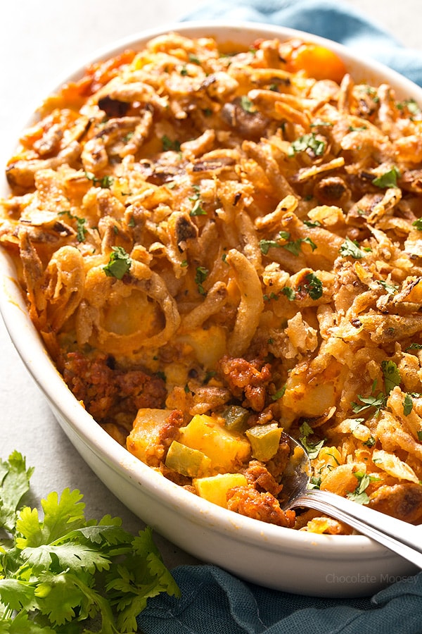 Homemade Cheesy Chorizo Potatoes made from scratch without canned soup doubles as both dinner and brunch. Elegant enough for the holidays yet casual enough for family dinner. Top them with French fried onions for a flavorful crunch.