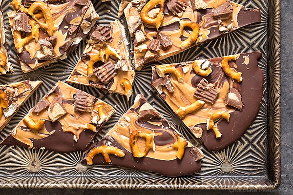 Satisfy your sweet tooth with sweet and salty Chocolate Peanut Butter Pretzel Bark with peanut butter cups. Make it as a gift or keep it all to yourself.