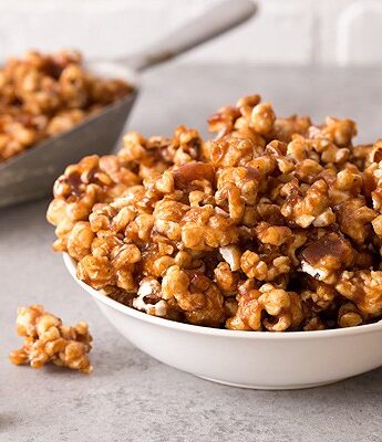 Whether you're watching your favorite TV show or need snacks for a big party coming up, sweeten up your popcorn bowl with Caramel Apple Butter Popcorn.