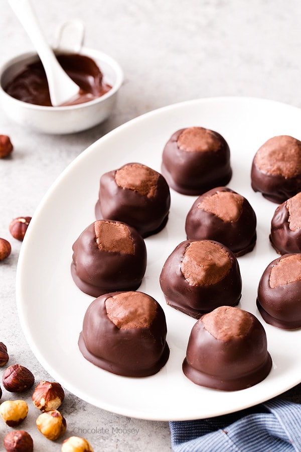 Break away from tradition and serve these Chocolate Hazelnut Buckeyes at your next party! The filling is made with chocolate hazelnut spread, giving this sweet treat a double dose of chocolate.