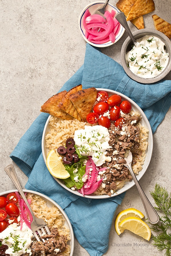 Whether you pronounce it jy-roh or yee-roh, one bite of these small scale Slow Cooker Gyro Rice Bowls with homemade tzatziki sauce will transport you to Greece. Recipe makes 4 servings, enough to realistically feed 1-2 people