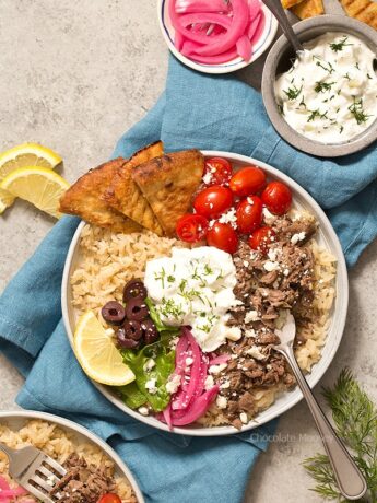 Whether you pronounce it jy-roh or yee-roh, one bite of these small scale Slow Cooker Gyro Rice Bowls with homemade tzatziki sauce will transport you to Greece. Recipe makes 4 servings, enough to realistically feed 1-2 people