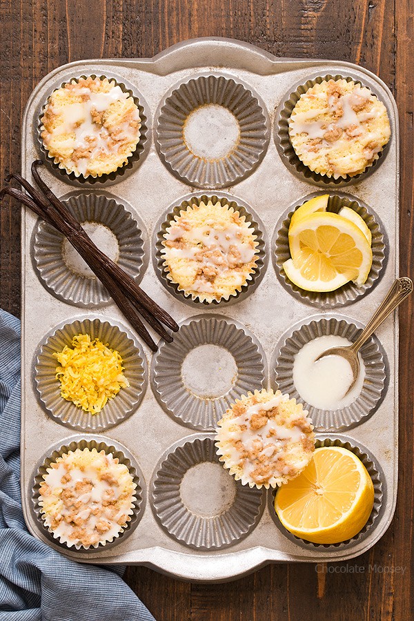 Lemon Crumb Muffins with lemons and vanilla bean in a muffin pan