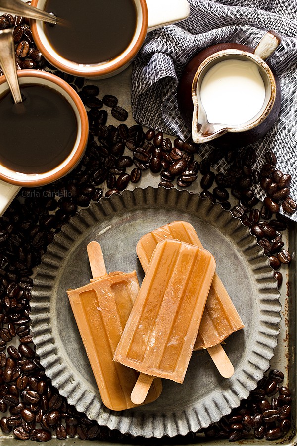 When it's hot outside and you need a caffeine boost while cooling down, keep these 3 ingredient Iced Coffee Popsicles in your freezer to get you through the day. 