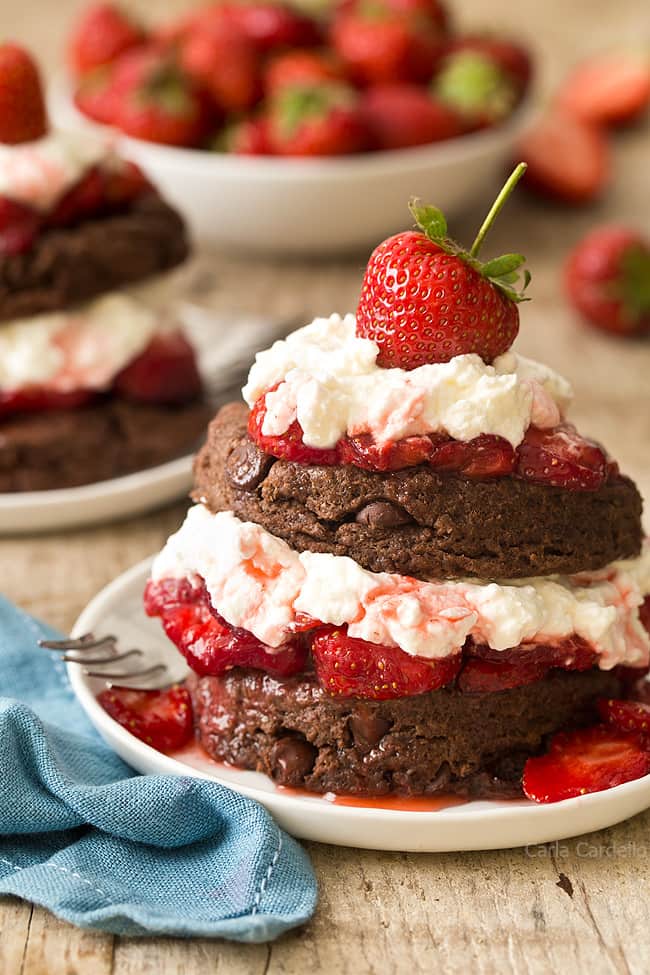 Learn how to make strawberry shortcake from scratch with Chocolate Strawberry Shortcake filled with fresh strawberries and homemade whipped cream. 