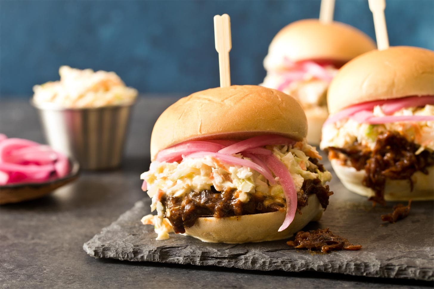 Slow Cooker Shredded Beef made into BBQ beef sliders