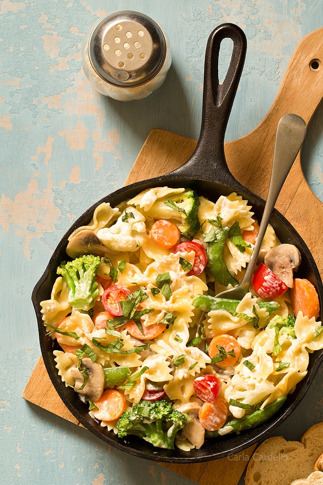 Get your daily serving of vegetables with One Skillet Pasta Primavera with a creamy Parmesan sauce! Customize your dinner by adding chicken, shrimp, and/or your favorite vegetables.