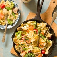 Get your daily serving of vegetables with One Skillet Pasta Primavera with a creamy Parmesan sauce! Customize your dinner by adding chicken, shrimp, and/or your favorite vegetables.