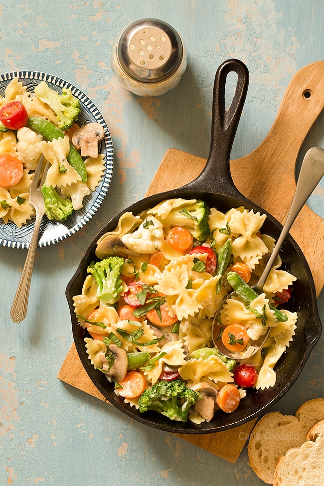 Get your daily serving of vegetables with One Skillet Pasta Primavera with a creamy Parmesan sauce! Customize your dinner by adding chicken, shrimp, and/or your favorite vegetables.