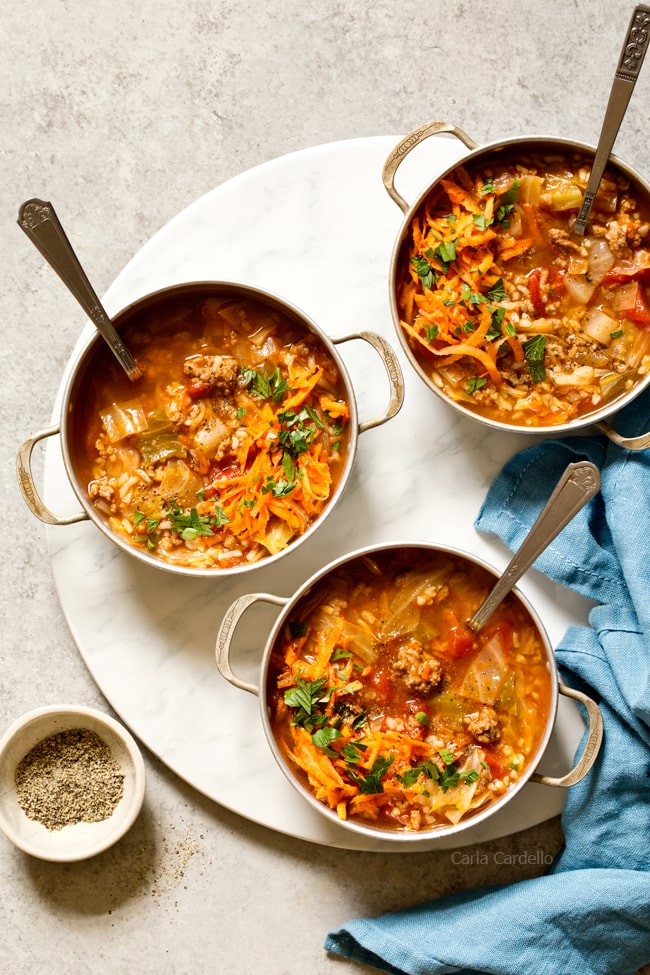 Stuffed Cabbage Soup has the same ingredients as stuffed cabbage rolls - ground beef, rice, tomatoes, and cabbage - minus the extra time and effort to assemble them. 