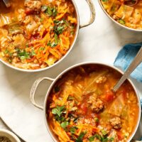 Stuffed Cabbage Soup has the same ingredients as stuffed cabbage rolls - ground beef, rice, tomatoes, and cabbage - minus the extra time and effort to assemble them.