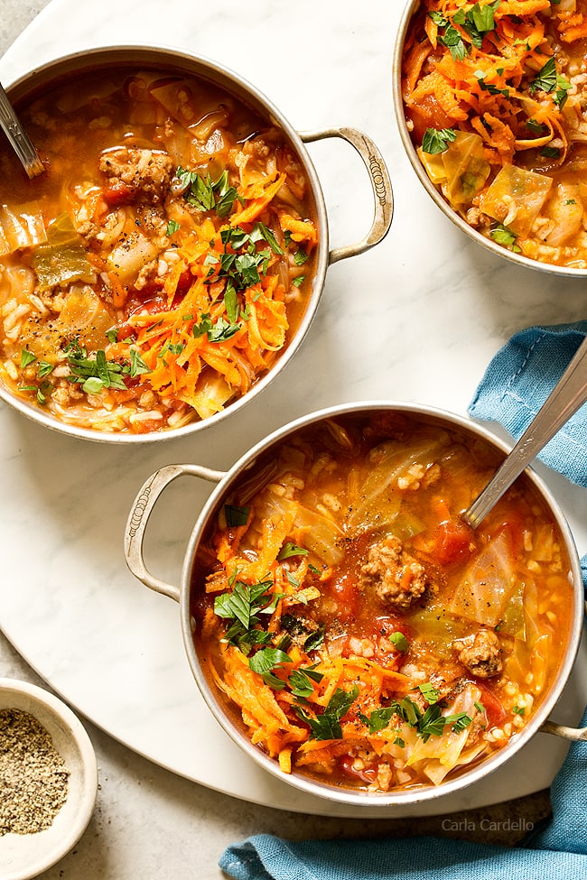 Stuffed Cabbage Soup has the same ingredients as stuffed cabbage rolls - ground beef, rice, tomatoes, and cabbage - minus the extra time and effort to assemble them.