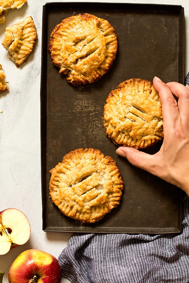 These small batch Apple Hand Pies made with pie crust are a taste of fall in every bite! This recipe freezes well, so you can make them ahead of time and bake when ready.