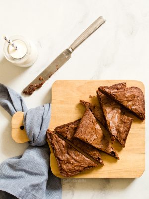 When you're craving chewy and fudgy brownies but only baking for two people, Small Batch Fudge Brownies are the answer! They're made with all cocoa powder and baked in a loaf pan. I also share the secret to getting shiny, cracked tops.