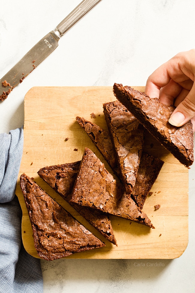 Hand holding small batch brownie