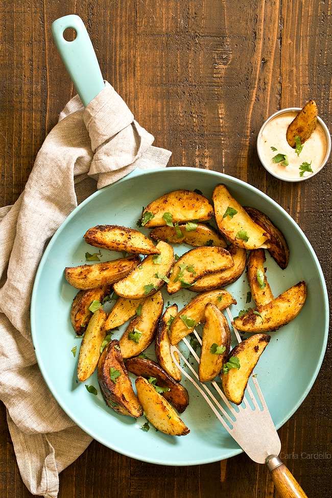 Blue skillet with pan fried potatoes