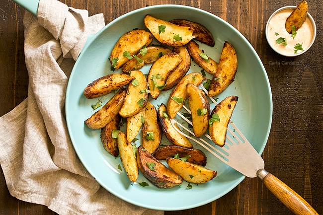 Blue skillet with pan seared potatoes