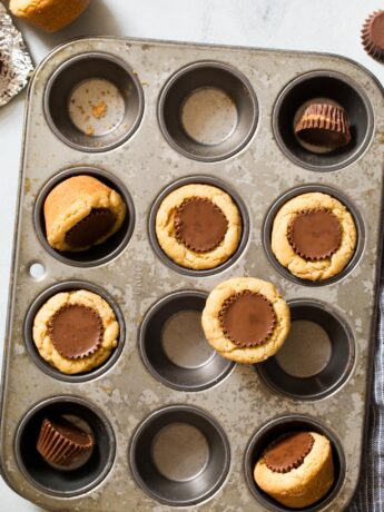 Peanut butter cup cookies on a mini muffin pan