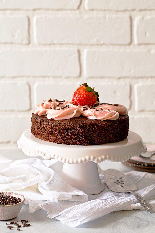 Small Chocolate Cake on white cake stand
