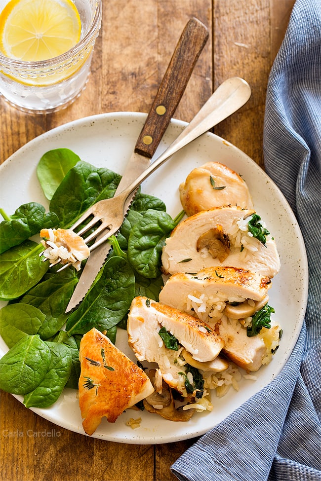 Mushroom Rice Stuffed Chicken Breast with cheese and spinach may seem like a fancy dinner for two, but it's an easy technique sure to impress. 