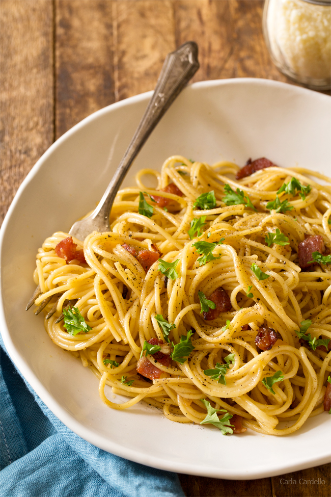 Have an easy romantic dinner at home with Spaghetti Carbonara For Two with bacon and cheese! Serve it with white wine and dessert for a stay-in date night.