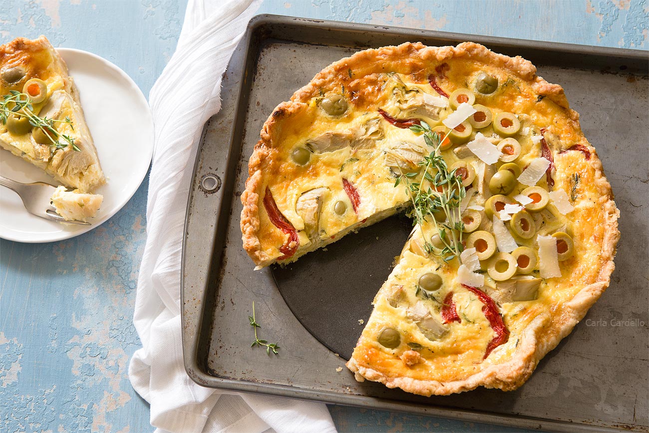 Vegetarian Quiche with slice missing