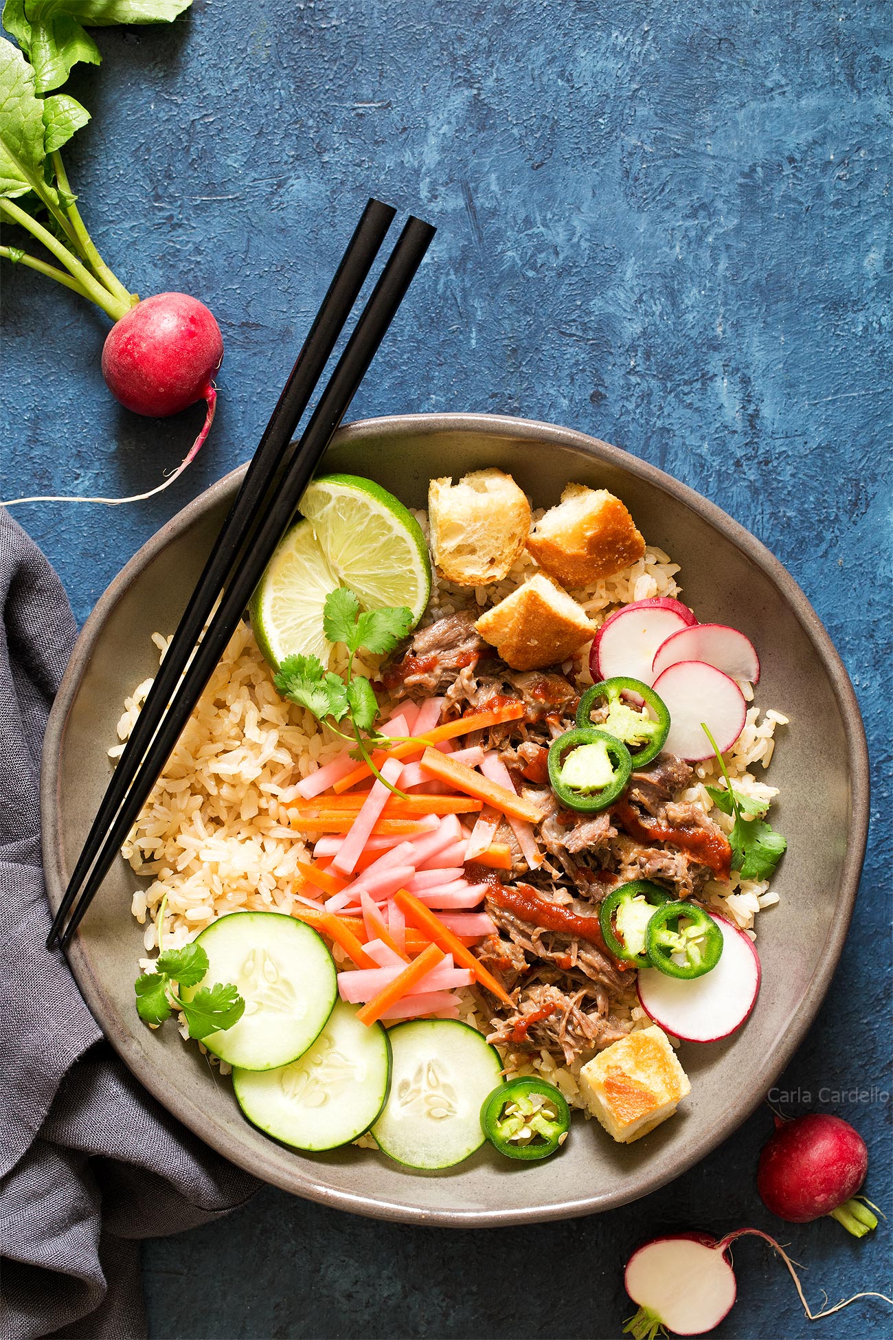 Slow Cooker Banh Mi Rice Bowls with pork, pickled vegetables, and baguette croutons.