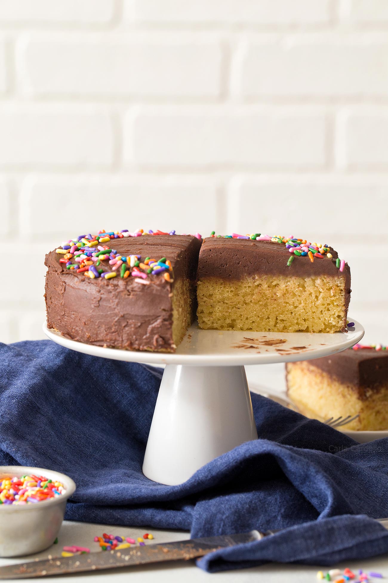 Small 6 Inch Yellow Cake For Two with homemade chocolate buttercream frosting for cake portion control.