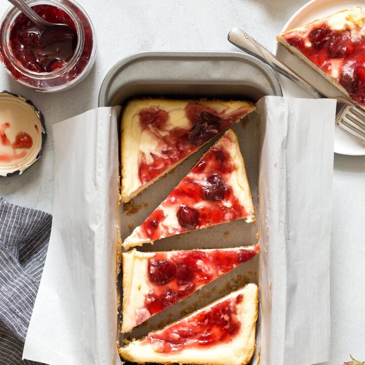 The best cheesecake recipe baked in a loaf pan! These Small Batch Strawberry Swirl Cheesecake Bars makes about 6 bars, ideal if you're looking for portion control.