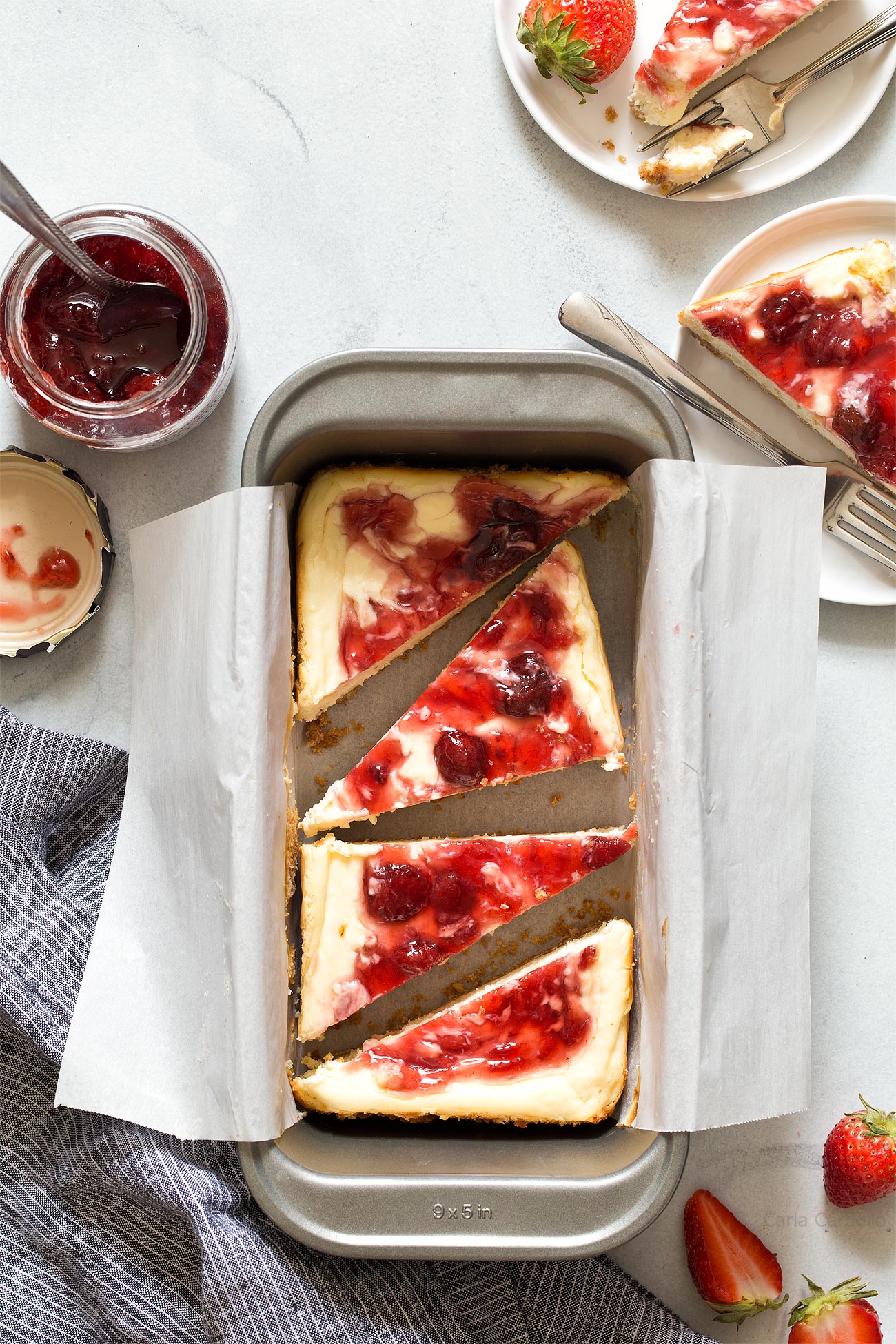 The best cheesecake recipe baked in a loaf pan! These Small Batch Strawberry Swirl Cheesecake Bars makes about 6 bars, ideal if you're looking for portion control.