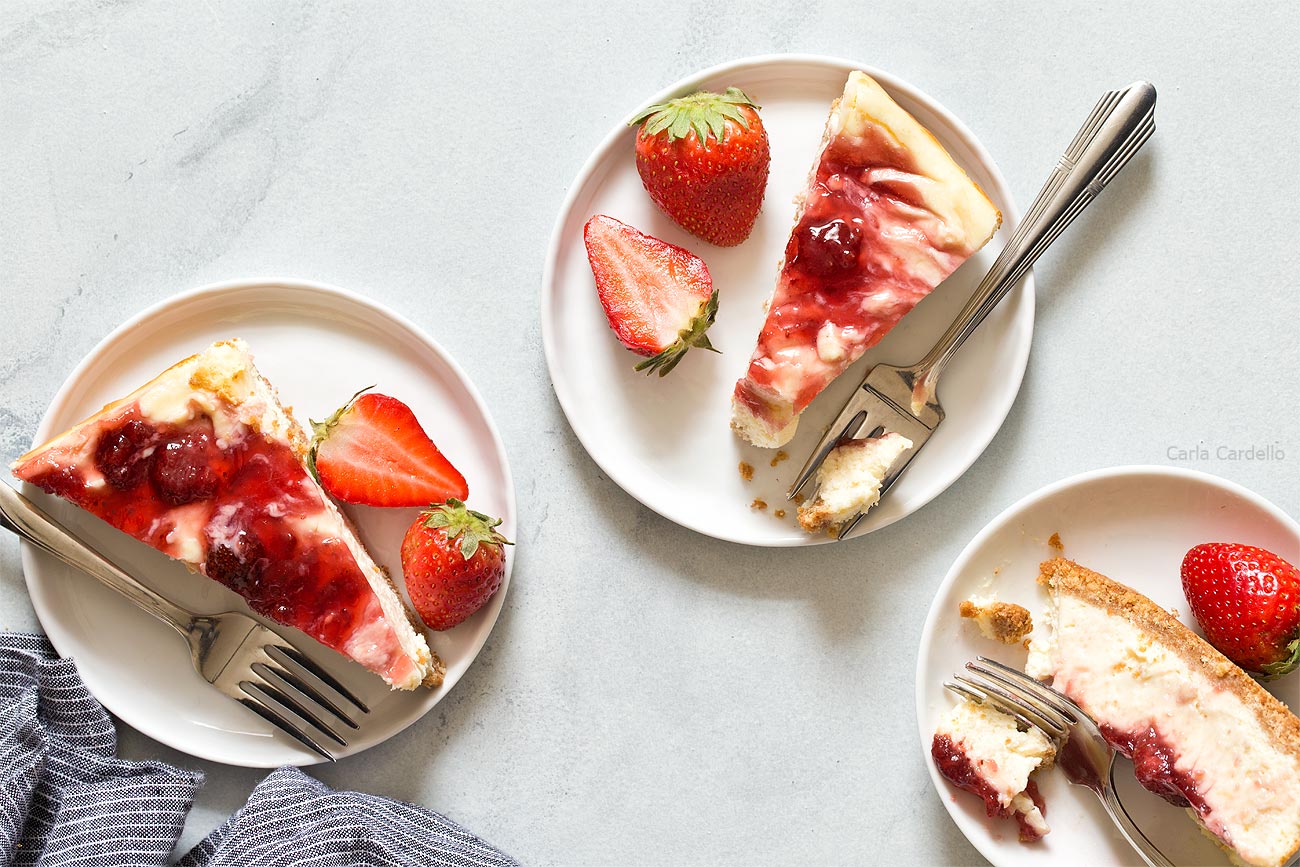 Small Batch Strawberry Swirl Cheesecake Bars cut into slices