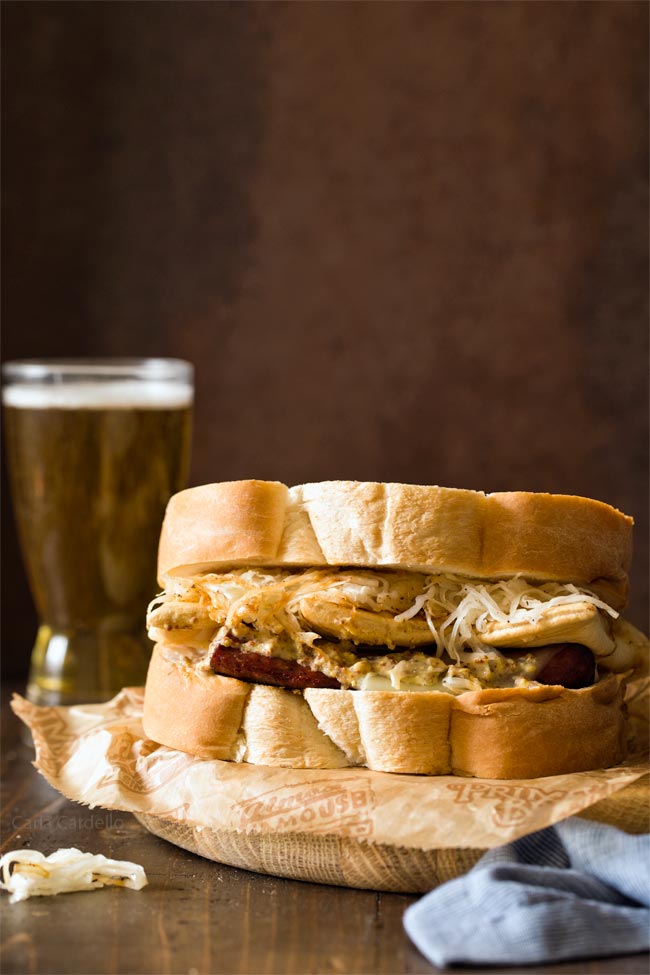 Polish Hill Pierogy Sandwich is Pittsburgh in a bite with kielbasa, pierogies, slaw, and beer mustard. 