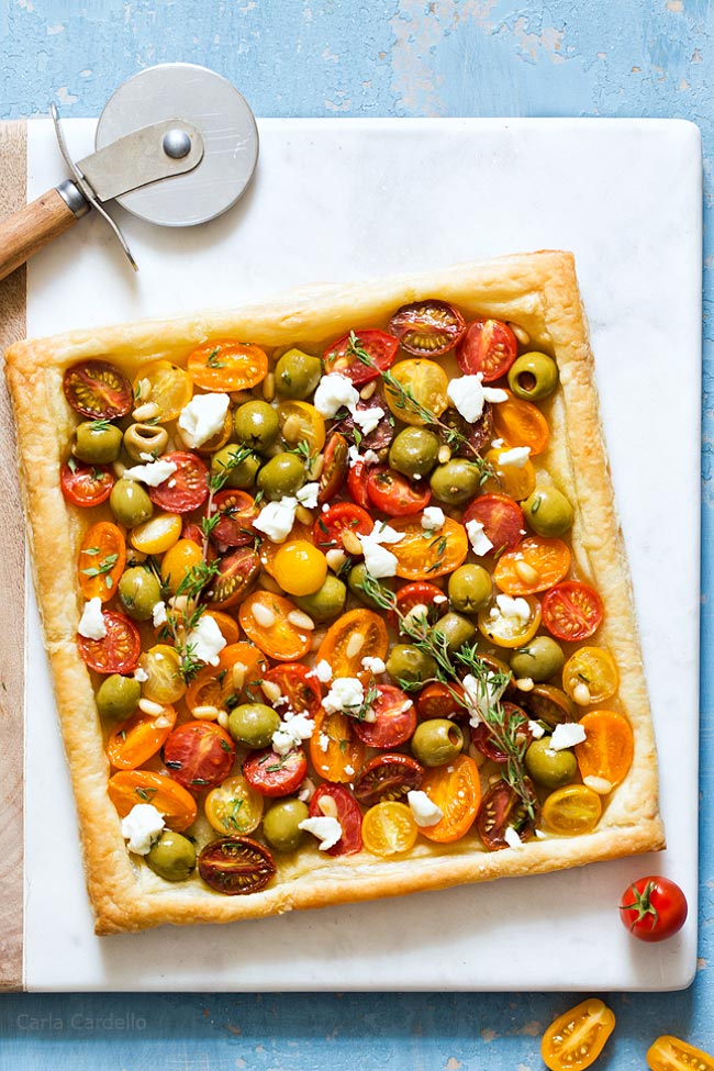 Tomato Puff Pastry Tart with Olives, Goat Cheese, and Pine Nuts