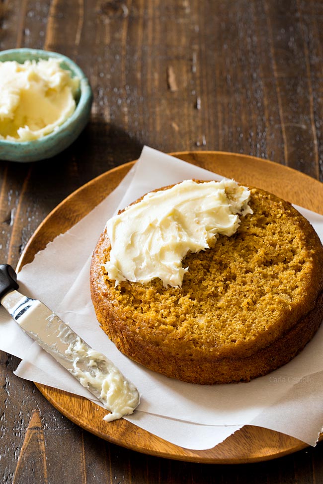 Cream Cheese Frosting on top of Small 6 Inch Pumpkin Cake