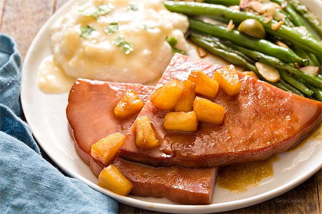 Honey Glazed Ham Steak dinner on white plate