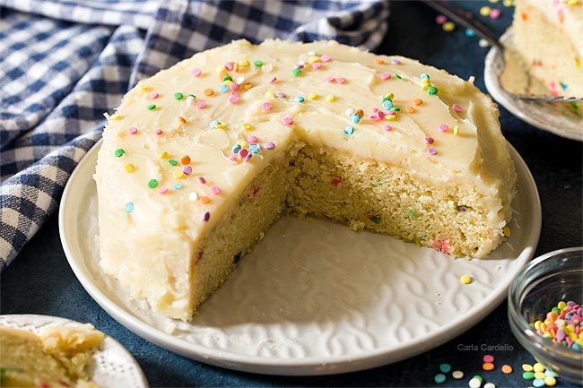 Homemade funfetti cake made from scratch on white serving platter