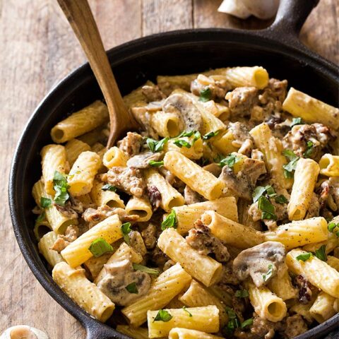 Sausage Mushroom Pasta with rigatoni and a creamy white Alfredo sauce is a hearty and comforting dinner for two.