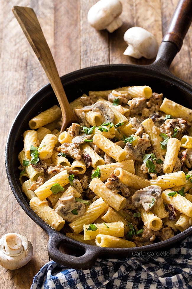 Sausage Mushroom Pasta with rigatoni and a creamy white Alfredo sauce is a hearty and comforting dinner for two. 