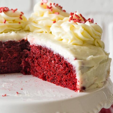 Close up of small red velvet cake on cake stand