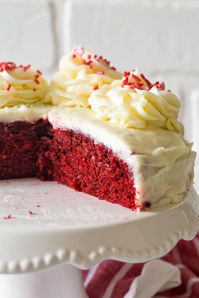 Close up of small red velvet cake on cake stand