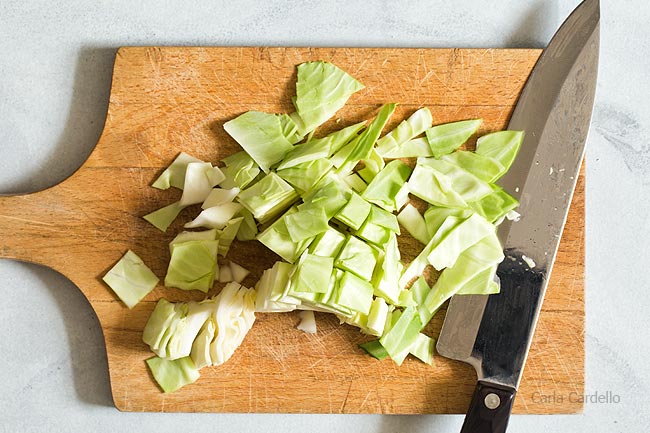 chopped cabbage on cutting board