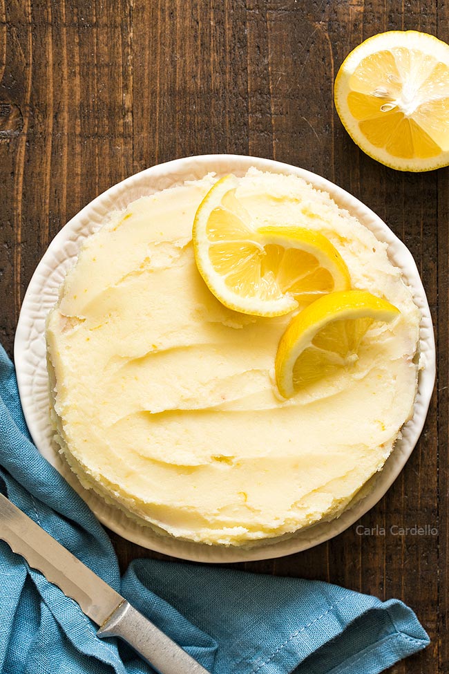 Small lemon cake with a knife and lemon