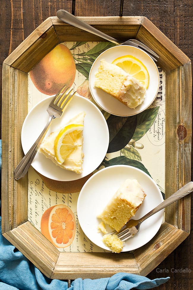 Slices of lemon cake on wooden tray